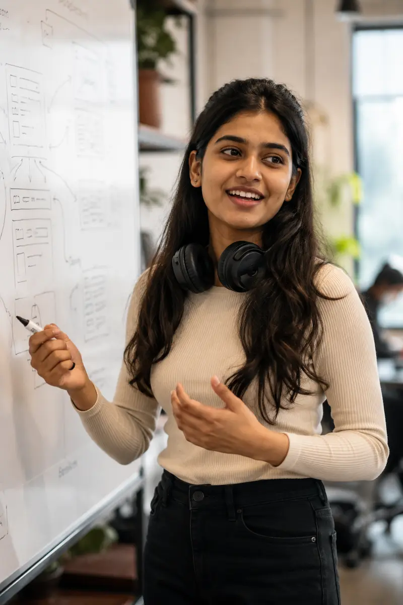 A BlueTick student at a whiteboard