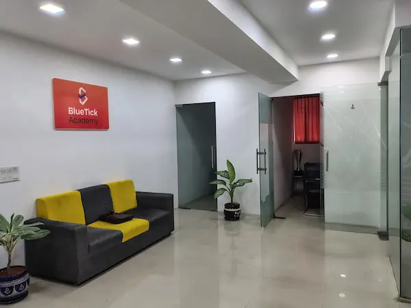 Reception and BlueTick AI Academy signage at the Indiranagar centre, Bangalore